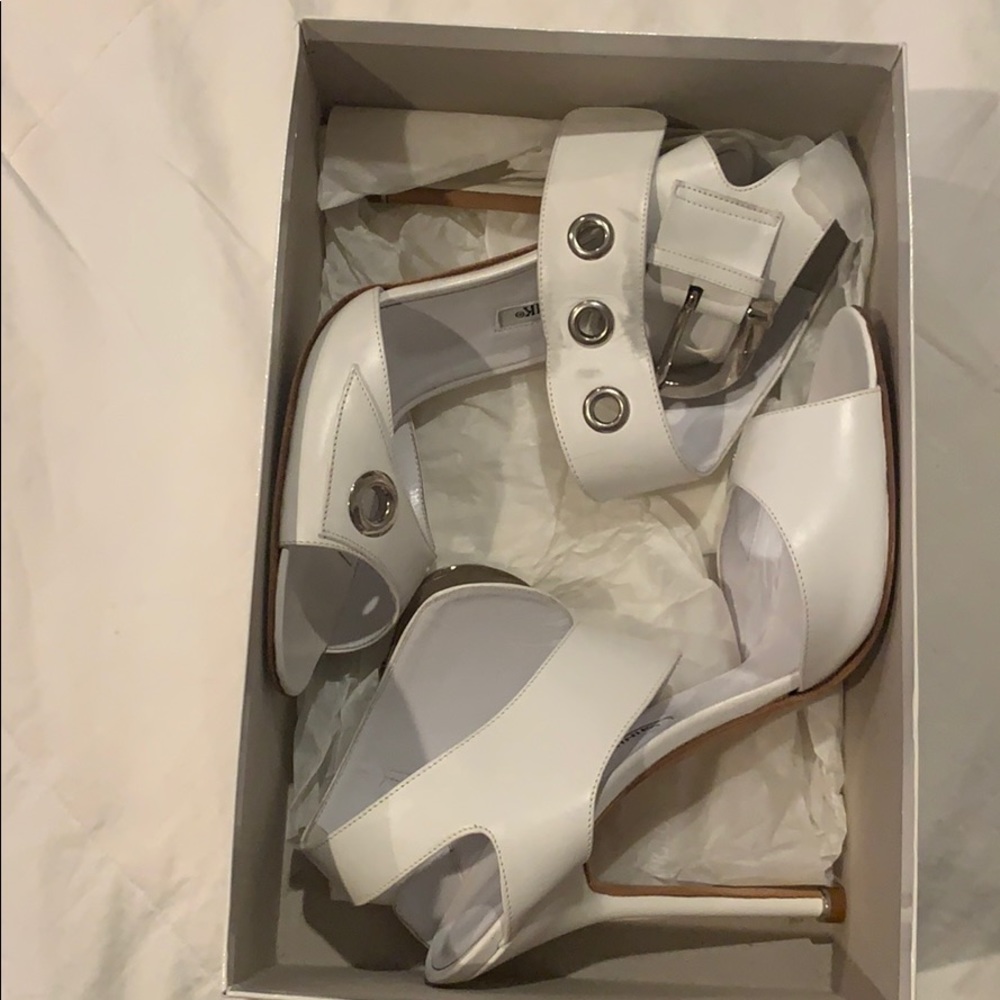 Manolo Blahnik white pumps